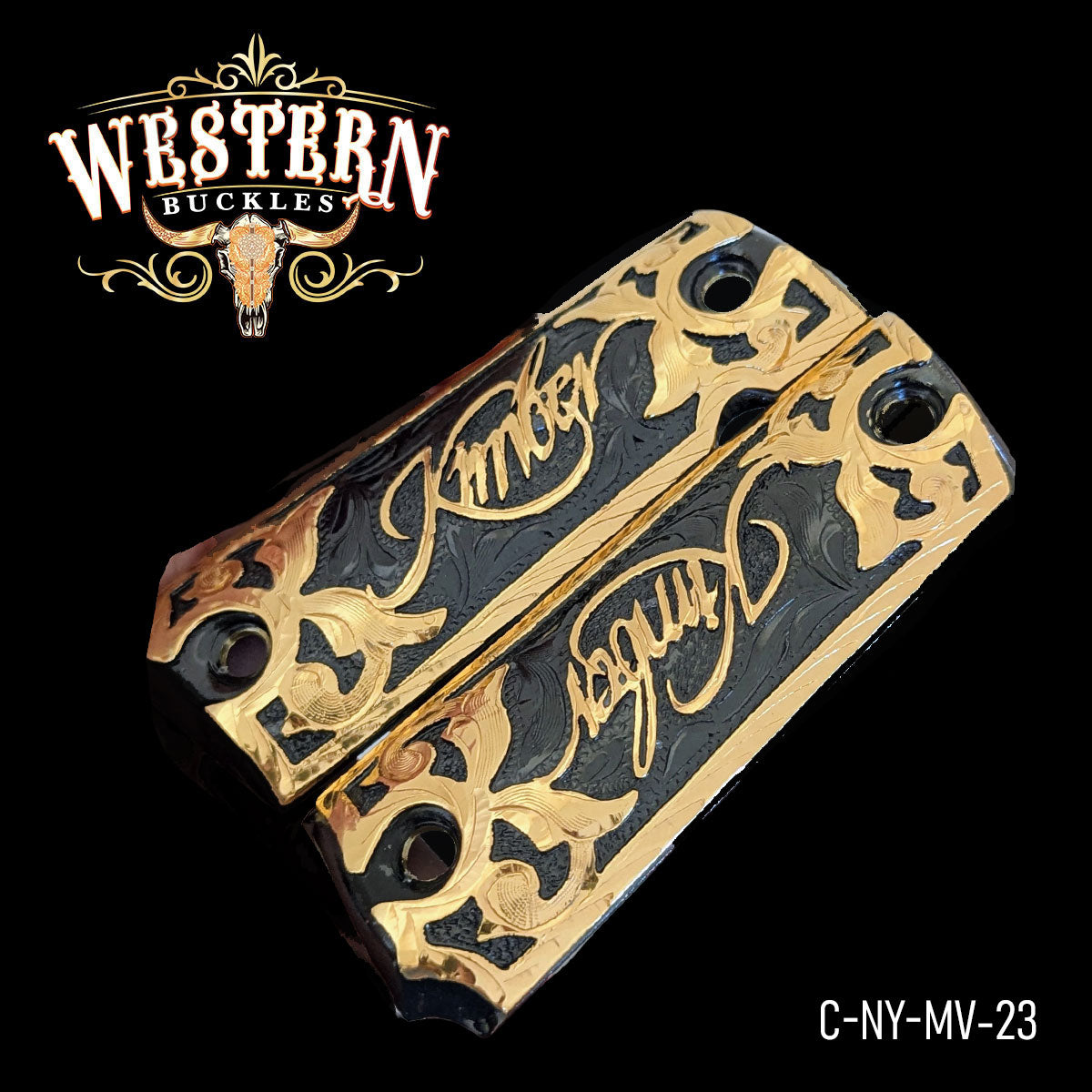 Black and gold Colt 1911 pistol grips with ornate engraved Kimber lettering.
