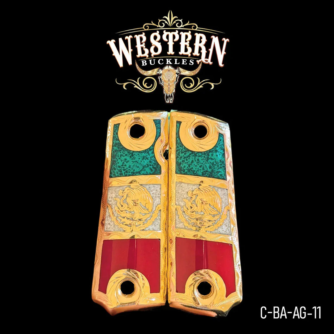 Gold Colt 1911 pistol grips with Mexican flag colors and engraved eagle design.