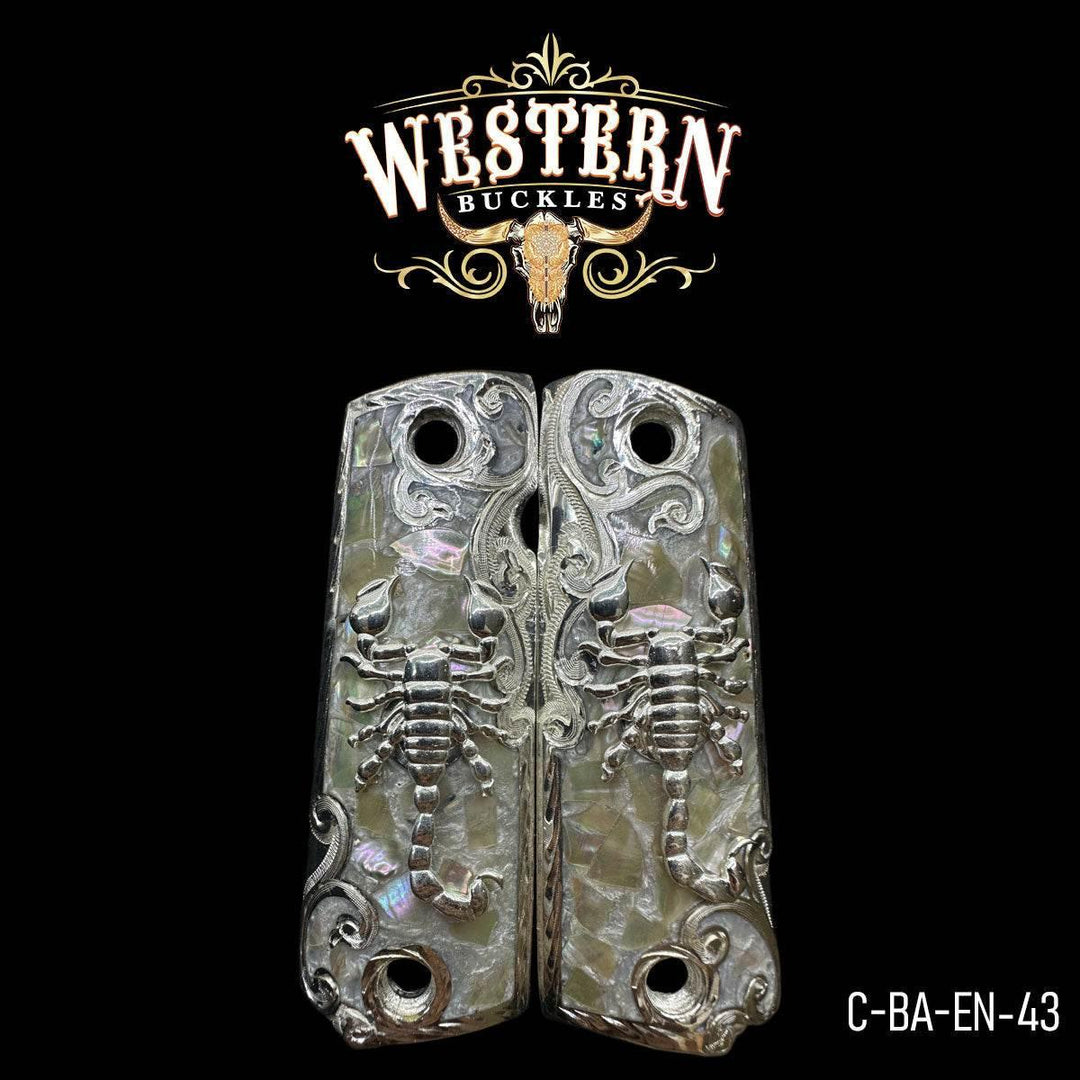 Colt 1911 pistol grips with silver scorpion design and engraved mother of pearl finish