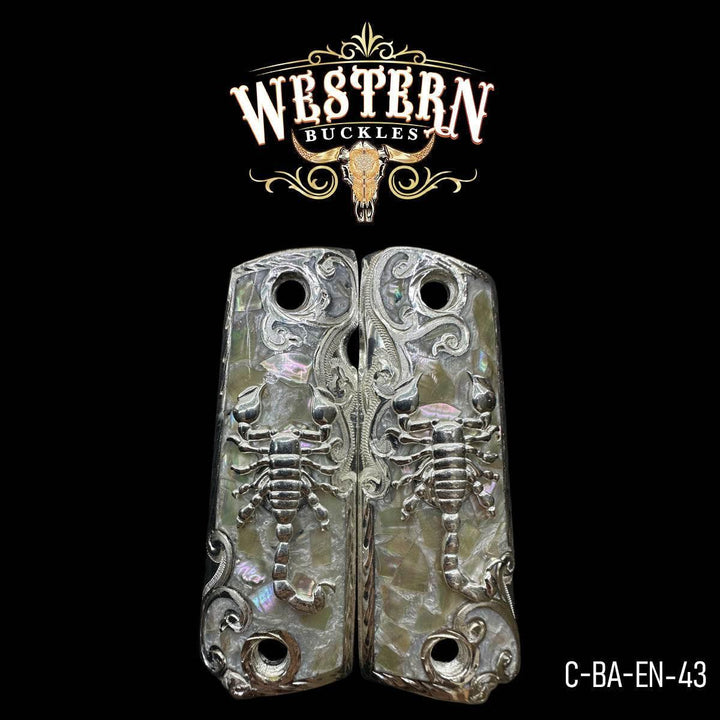 Colt 1911 pistol grips with silver scorpion design and engraved mother of pearl finish