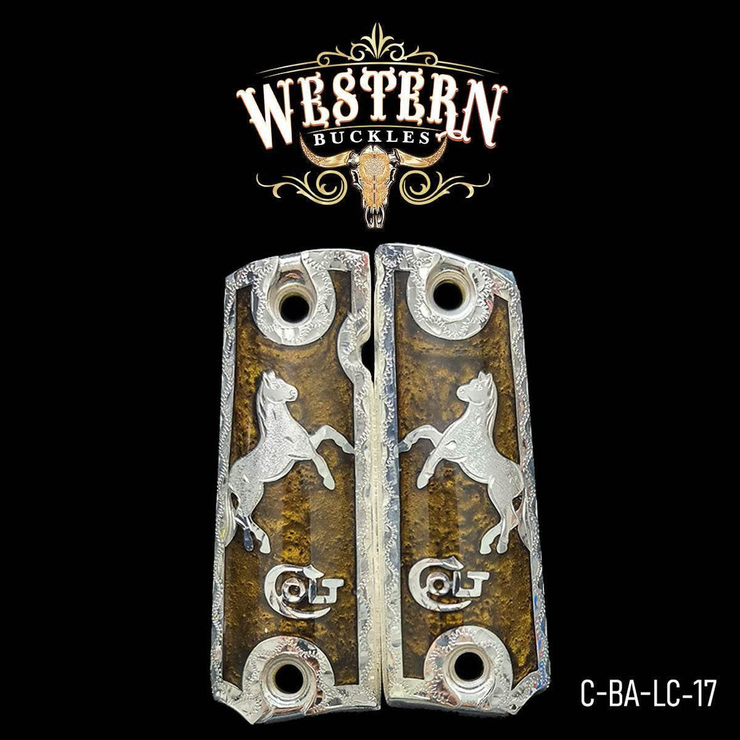 Custom Colt 1911 pistol grips with silver horse design and western engraved accents