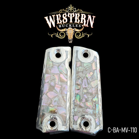 Custom Colt 1911 pistol grips with silver and mother of pearl inlay, engraved design