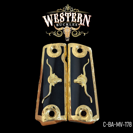 Black and gold Colt 1911 pistol grips with engraved longhorn design, western style