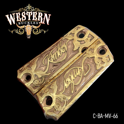 Engraved gold pistol grips with floral patterns and 'Kimber' text, model C-BA-MV-66.