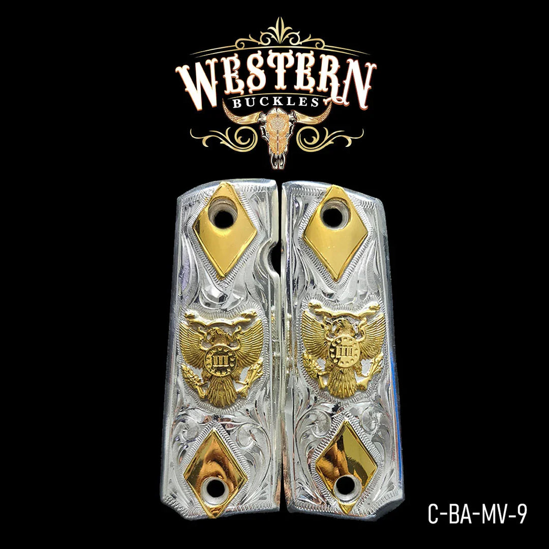 Custom silver 1911 pistol grips with gold eagle and diamond accents, engraved detailing