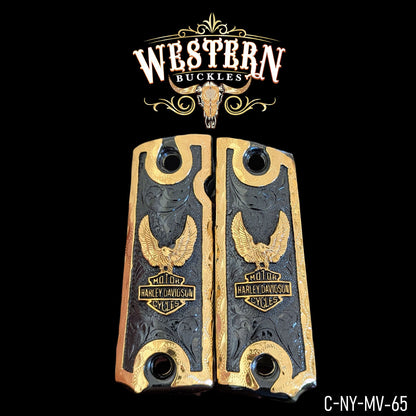 Gold and black engraved pistol grips with Harley Davidson eagle logo, custom Colt 1911 grips.