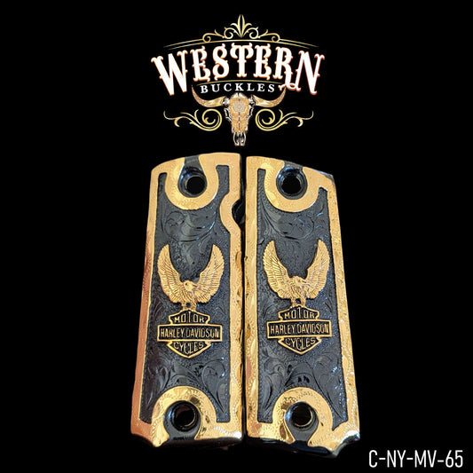 Gold and black engraved pistol grips with Harley Davidson eagle logo, custom Colt 1911 grips.