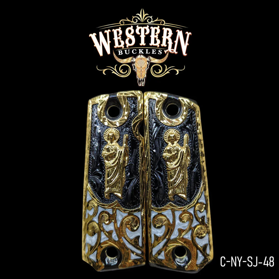 Gold and black engraved pistol grips with religious saint figure and ornate detailing.
