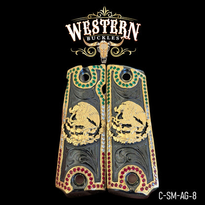 Custom Colt 1911 pistol grips with gold eagle design, red and green accents, engraved details.