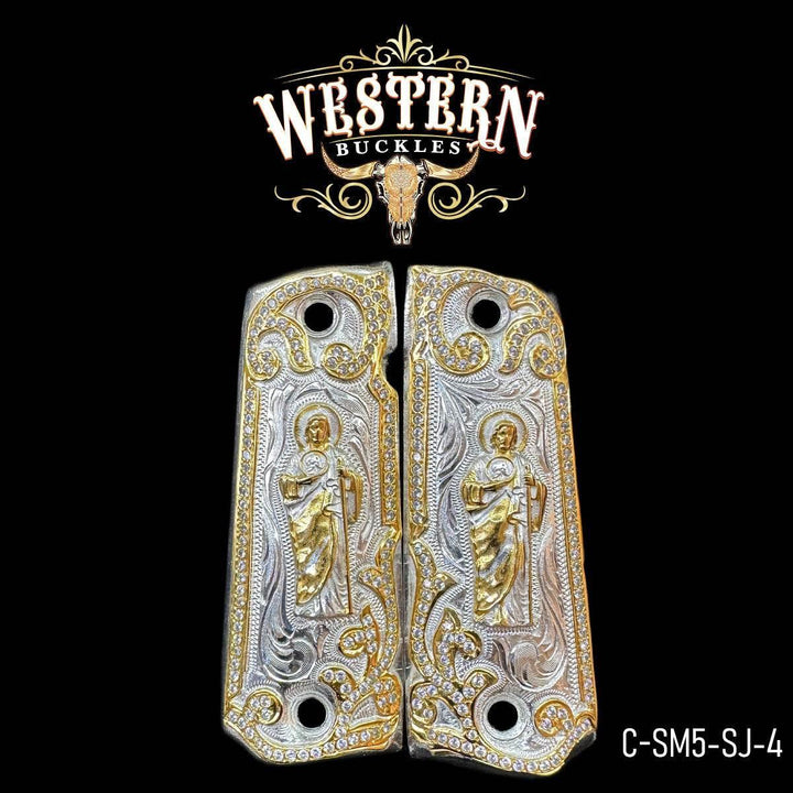 Engraved silver and gold pistol grips with saint figure for Colt 1911 handgun.