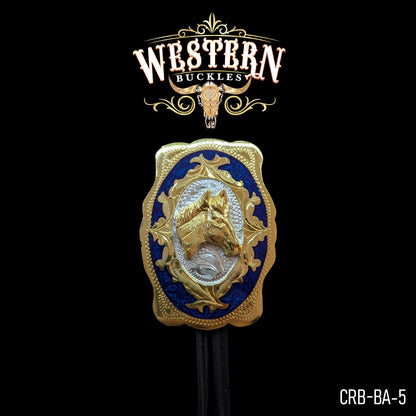 Western belt buckle with gold horse head, blue and gold ornate border on black background