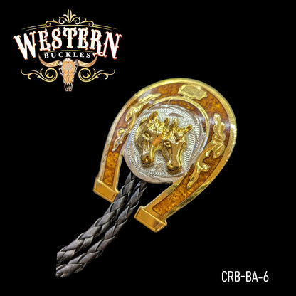 Western horse head bolo tie with gold horseshoe and braided leather cord