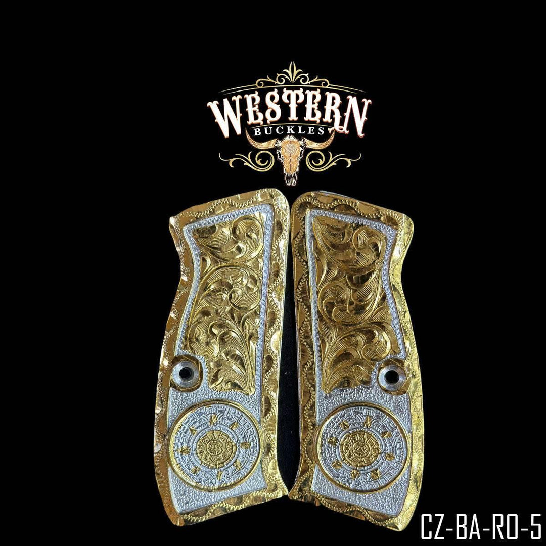 Ornate gold and silver Colt 1911 custom pistol grips with engraved western design