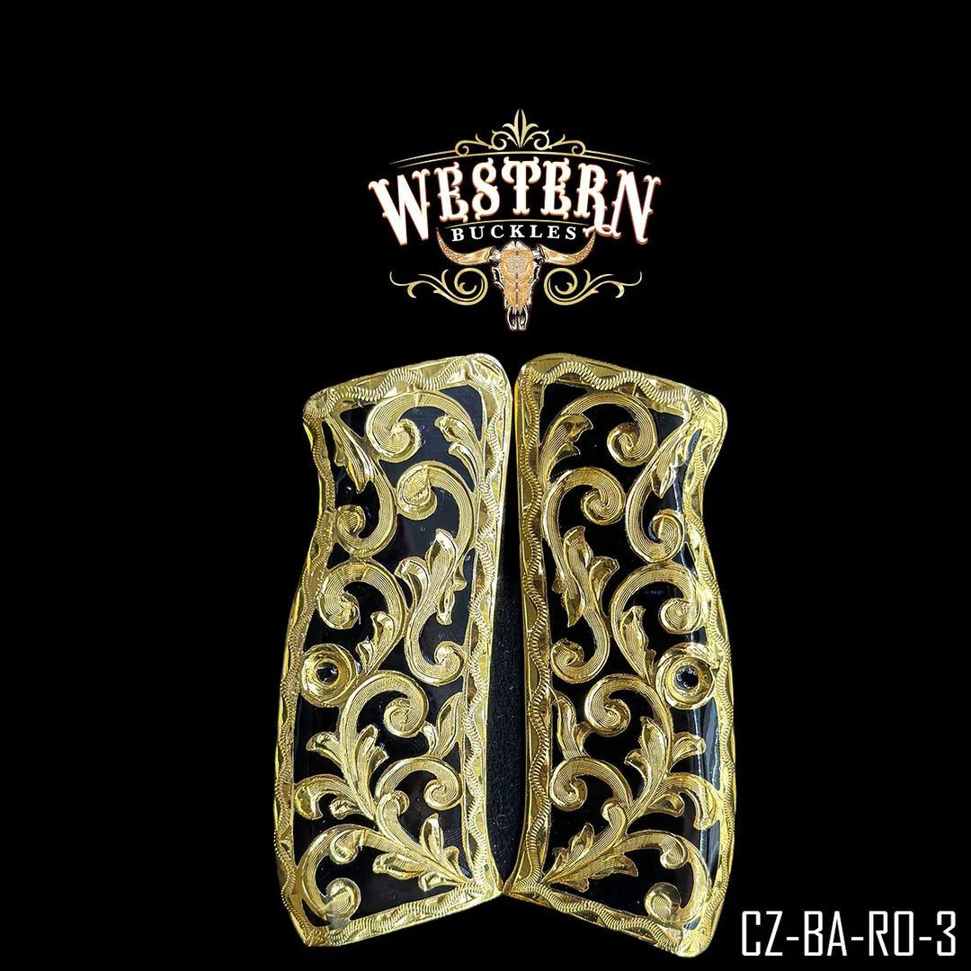 Ornate gold and black pistol grips with floral design, custom 1911 gun accessory.