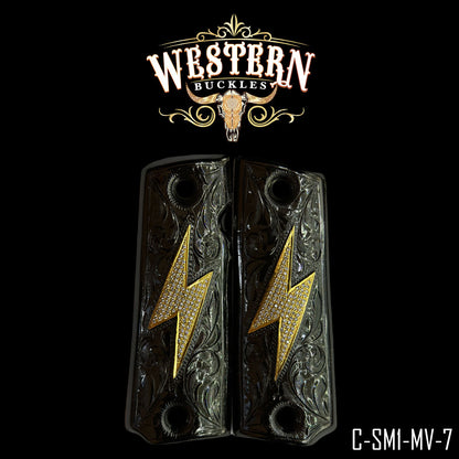 Custom Colt 1911 pistol grips with engraved design and gold lightning bolt accents
