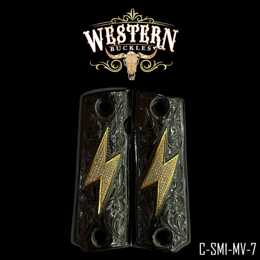 Custom Colt 1911 pistol grips with engraved design and gold lightning bolt accents