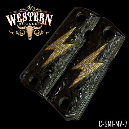 Custom Colt 1911 pistol grips with gold lightning bolt and engraved black finish