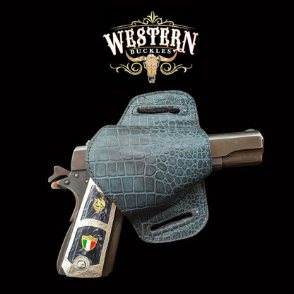 Custom 1911 pistol with engraved grips and reptile-patterned leather holster