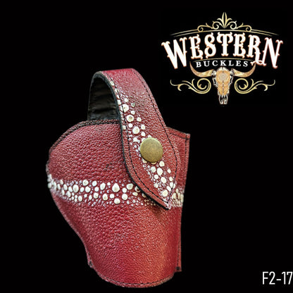 Red leather western pistol holster with white dot accents and brass snap button