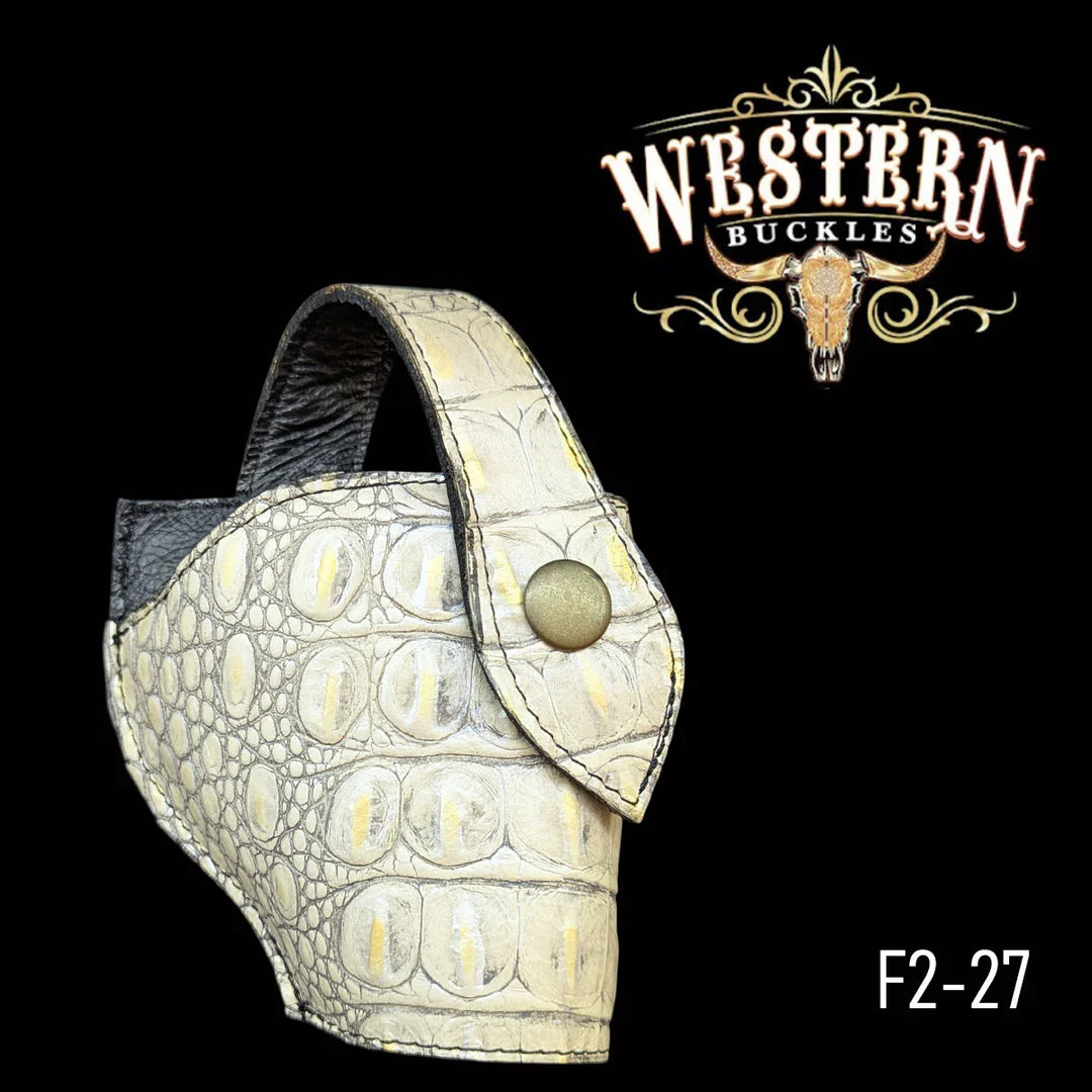 Textured leather pistol holster with snap closure, Western style, beige with crocodile pattern.