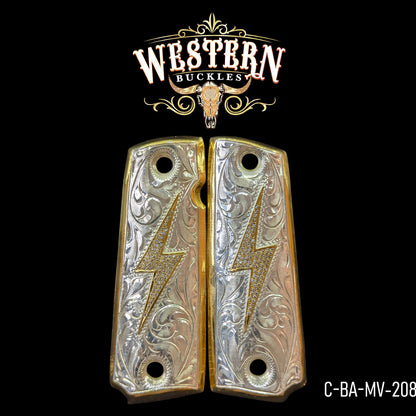 Engraved silver and gold Colt 1911 pistol grips with lightning bolt design