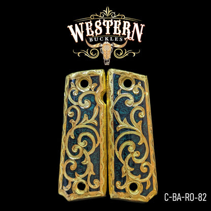 Gold engraved 1911 pistol grips with ornate scroll design, custom gun accessories.