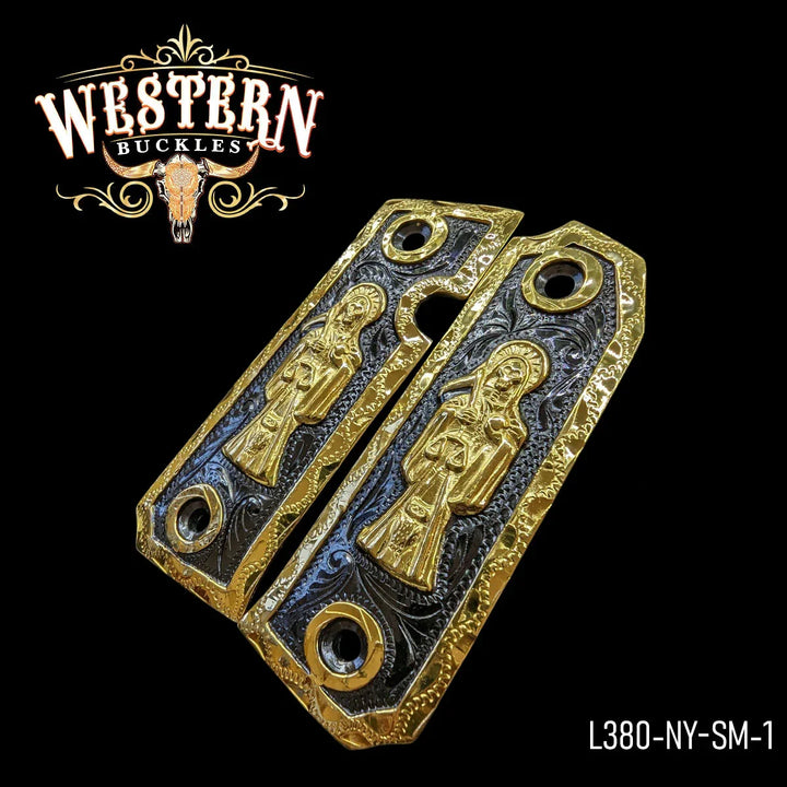 Gold and black pistol grips with engraved religious figure, custom 1911 grips, Western style.