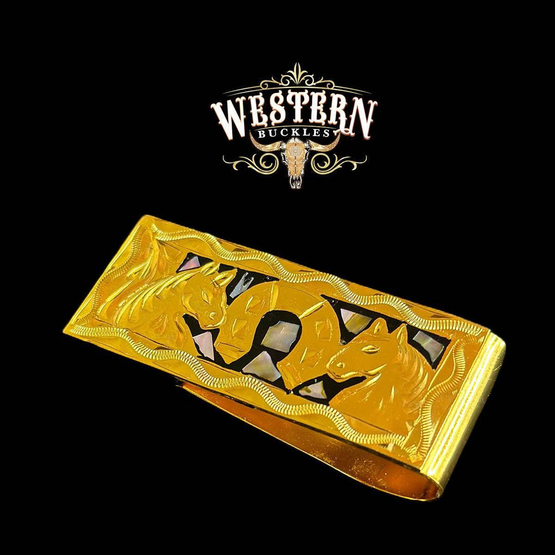 Gold western money clip with engraved horse heads and inlay, set on black background