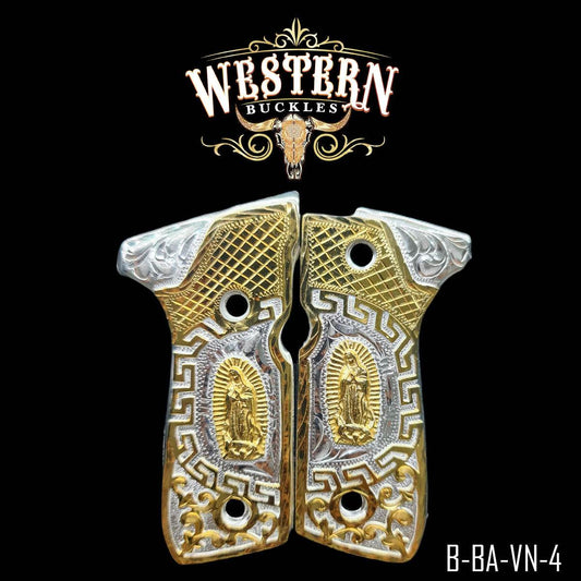 Gold and silver engraved Colt 1911 pistol grips with religious motif and ornate patterns