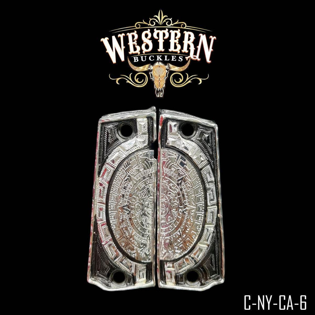 Custom Aztec calendar silver Colt 1911 grips with detailed engraved design on black background